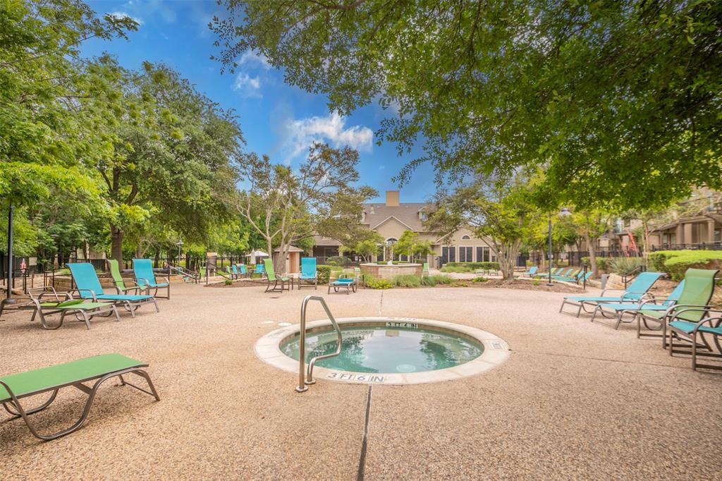 11203 Ranch Road 2222, Unit 2404 Austin, TX 78730 - Photo 25 of 28 View of swimming pool featuring patio surround, a hot tub, and a pool