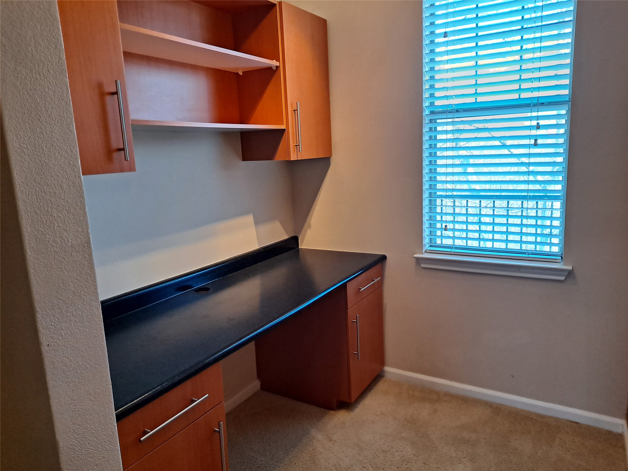 11203 Ranch Road 2222, Unit 2404 Austin, TX 78730 - Photo 9 of 28 Unfurnished office with built in desk and light colored carpet