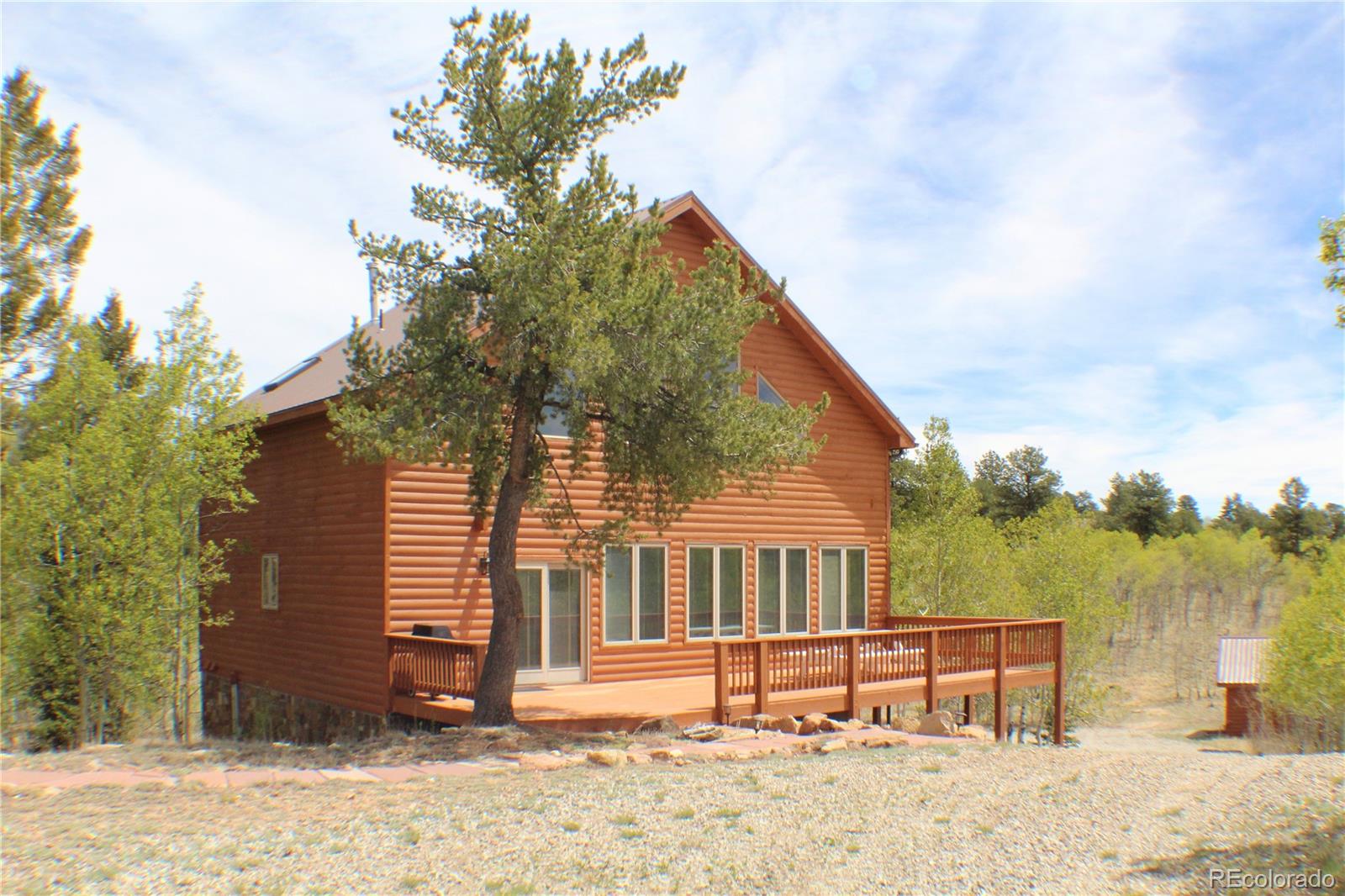 8221 Remington Road Como, CO 80432 - Photo 4 of 49 a view of a house with a yard and sitting area