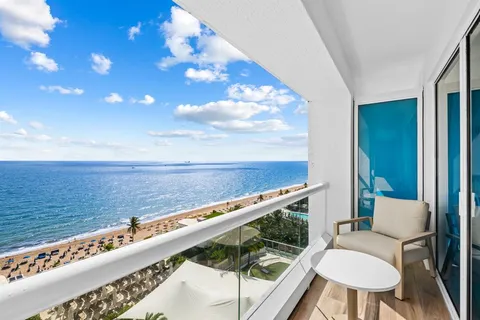 a terrace with a table and chairs