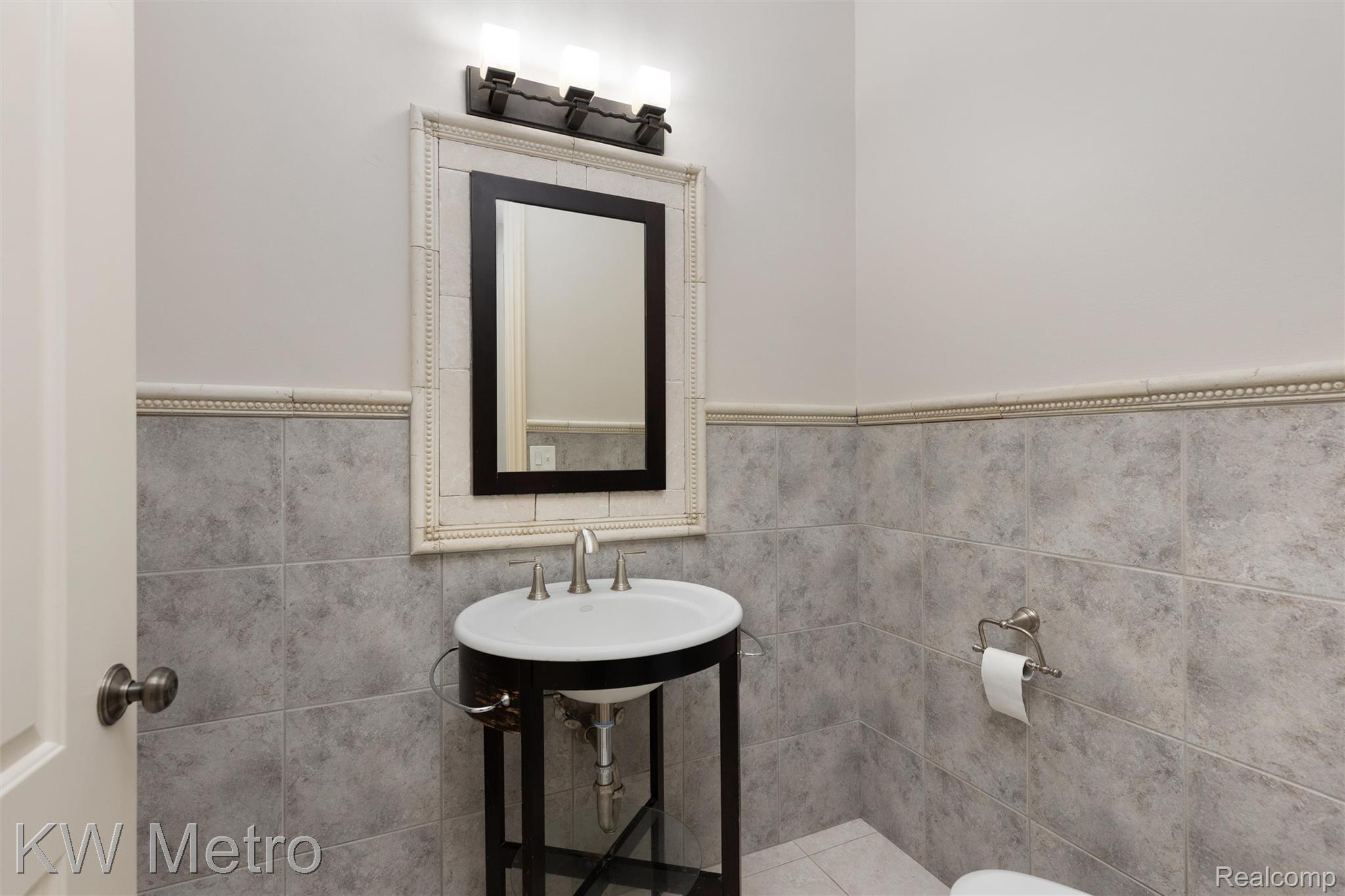 65884 Windrose Court Ray, MI 48096 - Photo 58 of 82 Bathroom featuring toilet and a sink