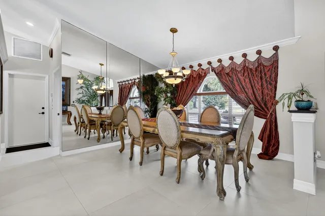 a kitchen with stainless steel appliances granite countertop a sink and dishwasher a stove top oven with wooden floor