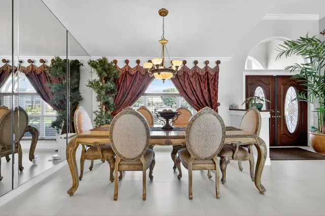 a kitchen with stainless steel appliances granite countertop a sink and a microwave