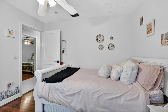 a bathroom with a bathtub and window