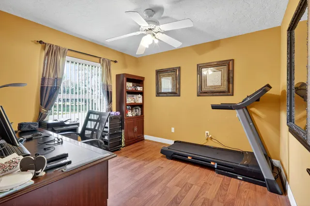 a bathroom with a shower a toilet and a shower