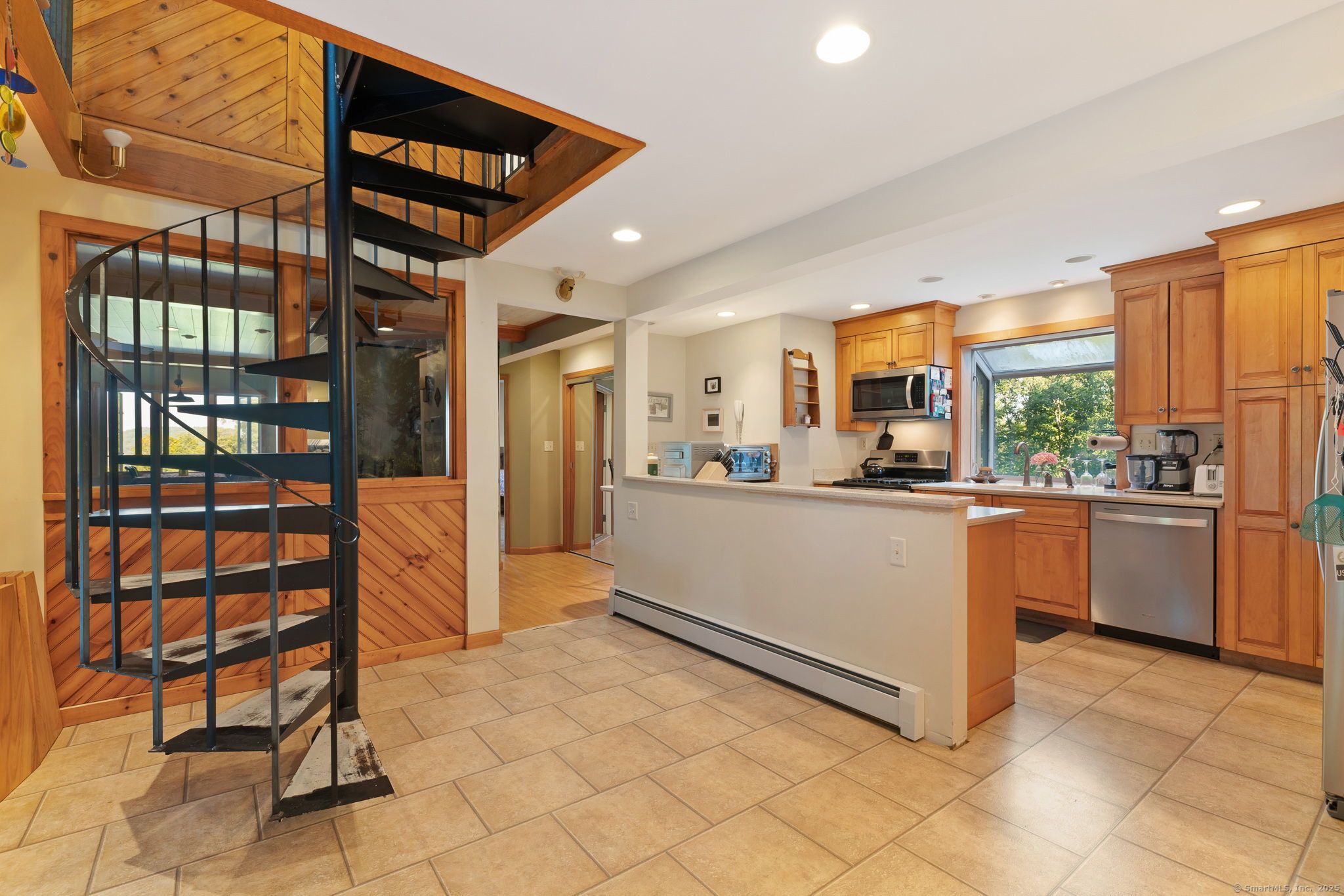 68 Johnson Road Canaan, CT 06031 - Photo 15 of 40 Spiral staircase and Kitchen area