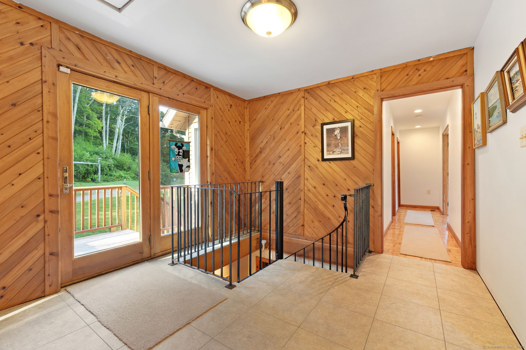 68 Johnson Road Canaan, CT 06031 - Photo 25 of 40 Upper level landing with doors to the deck.