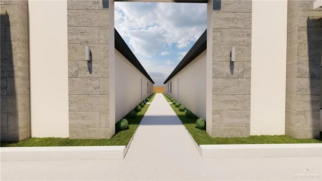 a view of entryway with flower plants