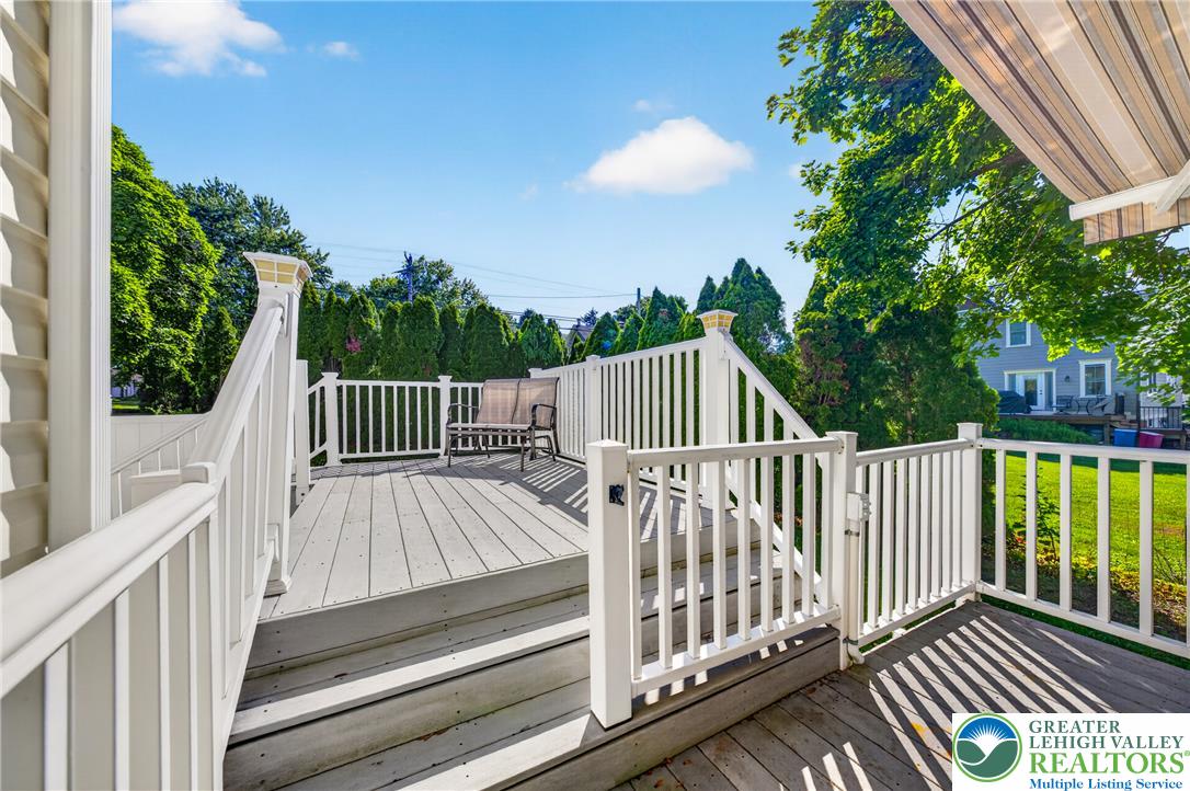 1702 Red Bud Road Quakertown, PA 18951 - Photo 63 of 68 A spacious wooden deck with crisp white railings provides an ideal setting for outdoor relaxation.
