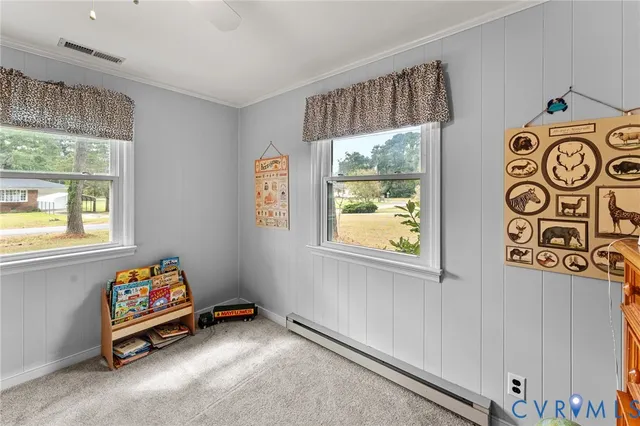 a bench sitting in a room next to a window