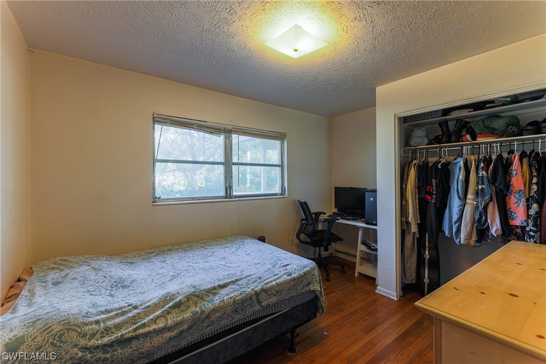 2914 Sunset Road Fort Myers, FL 33901 - Photo 22 of 28 a bedroom with a bed and a window