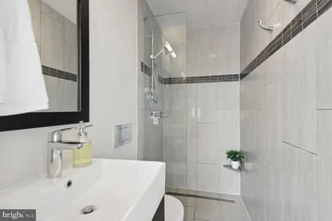 a bathroom with a sink and a tub