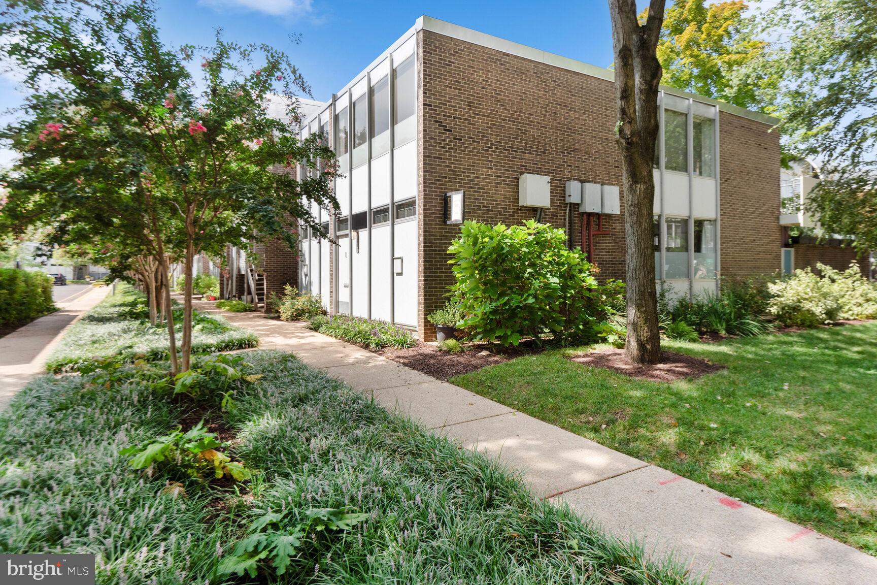 345 O Street Southwest Washington, DC 20024 - Photo 25 of 46 a view of a brick building next to a yard