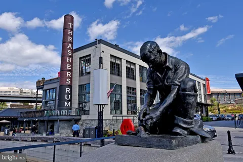 a front view of a building with retail shops