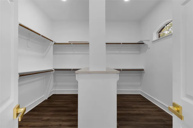 a view of an empty walk in closet