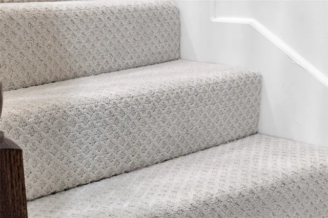 a view of a backyard with tree