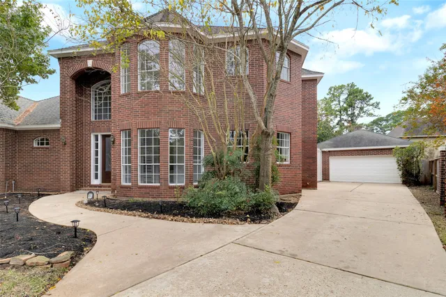 a view of entryway livingroom and hall with wooden floor