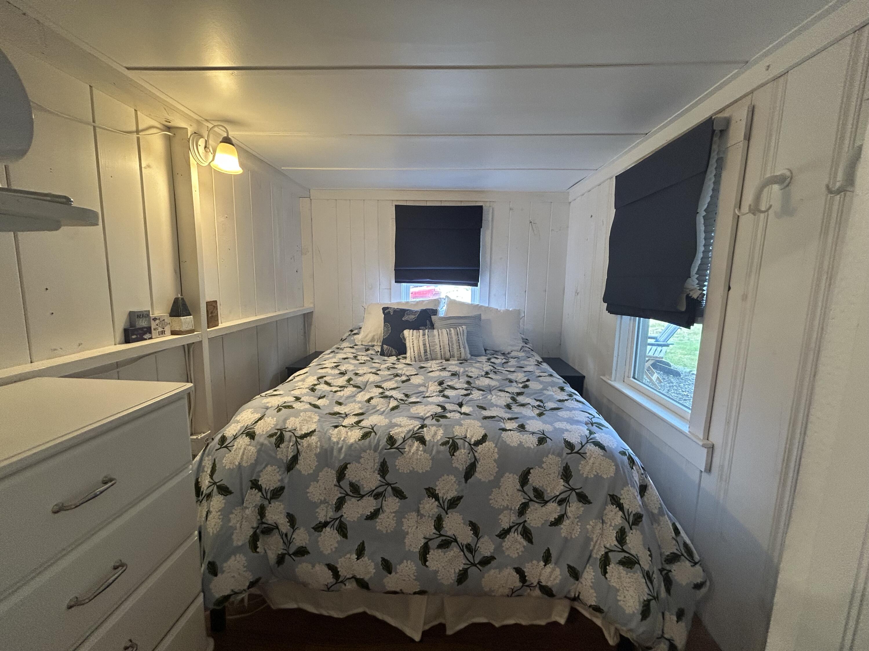262 Old Wharf Road, Unit U67 Dennis Port, MA 02639 - Photo 13 of 54 a bedroom with a bed and a window
