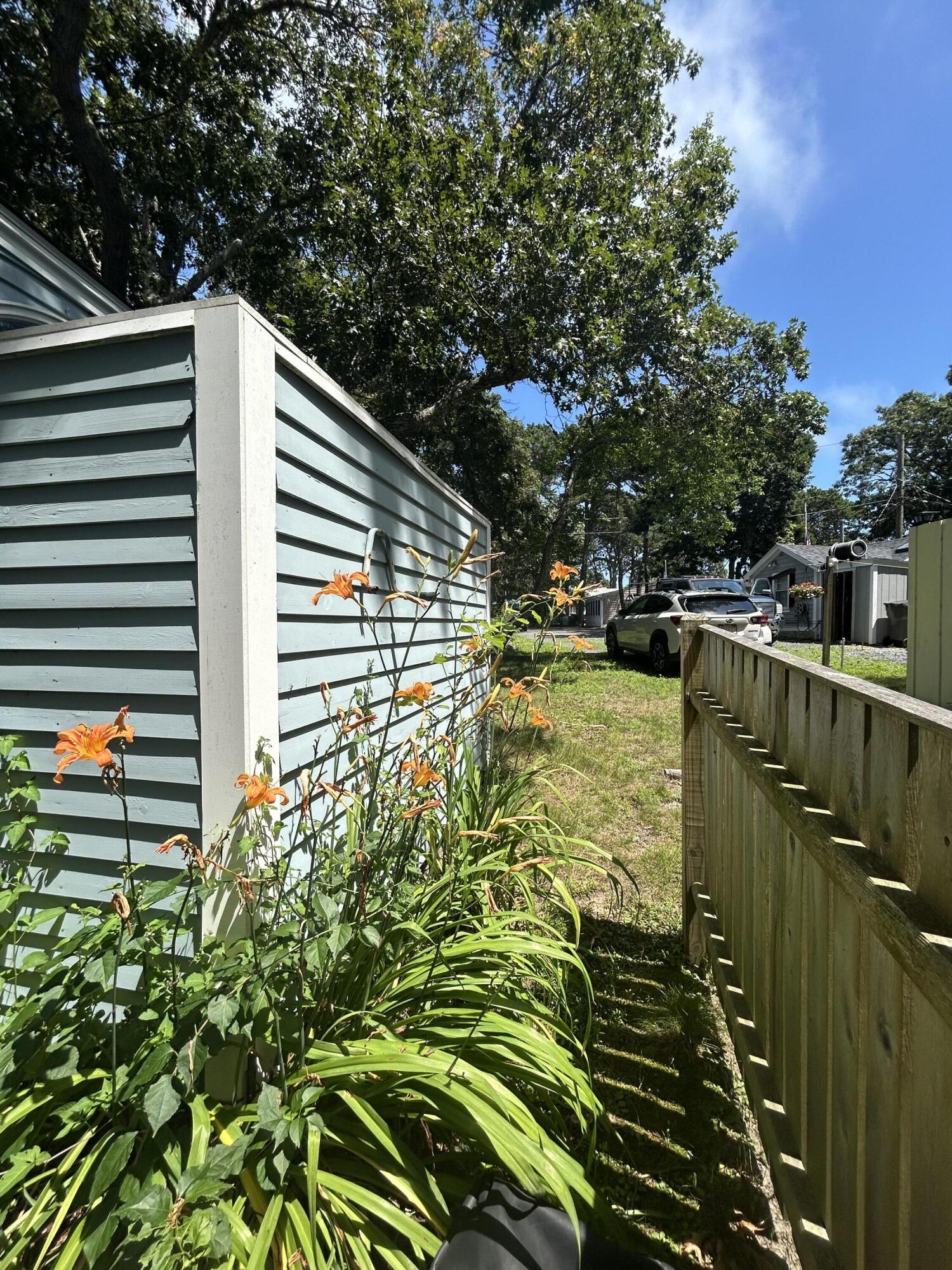 262 Old Wharf Road, Unit U67 Dennis Port, MA 02639 - Photo 35 of 54 a view of outdoor space and yard