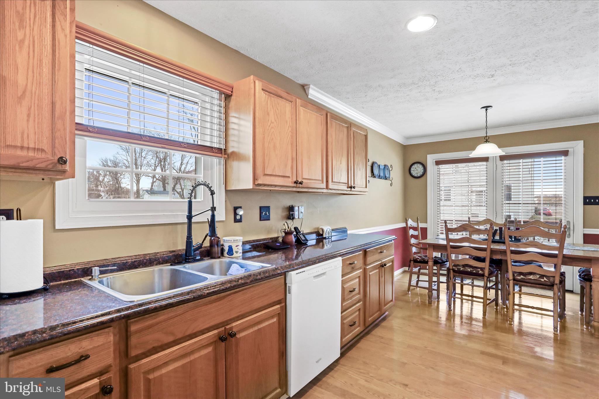 107 Briar Run Drive Ranson, WV 25438 - Photo 14 of 45 a kitchen with lots of counter top space and dining table