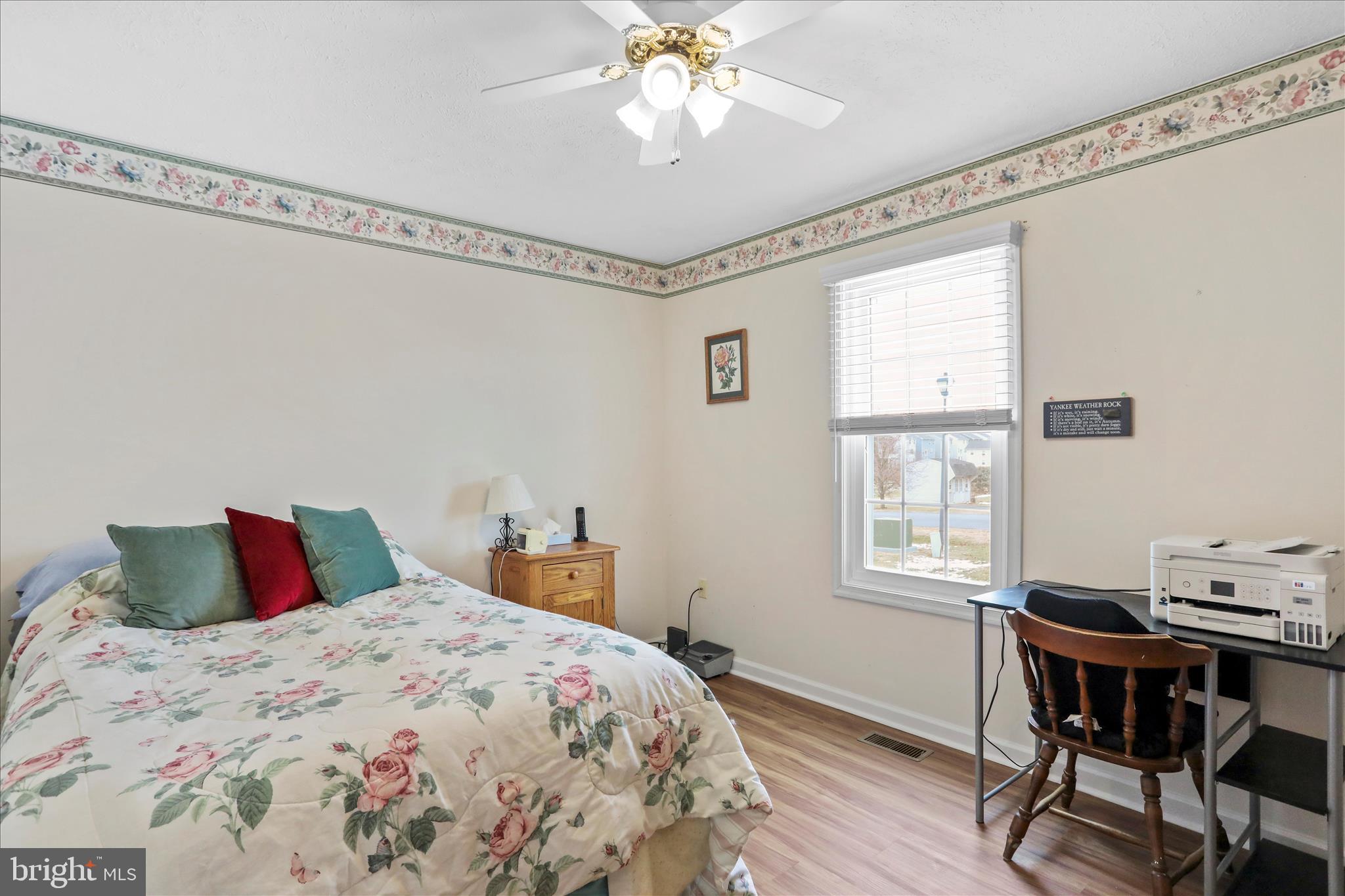 107 Briar Run Drive Ranson, WV 25438 - Photo 17 of 45 a bedroom with a bed and a table