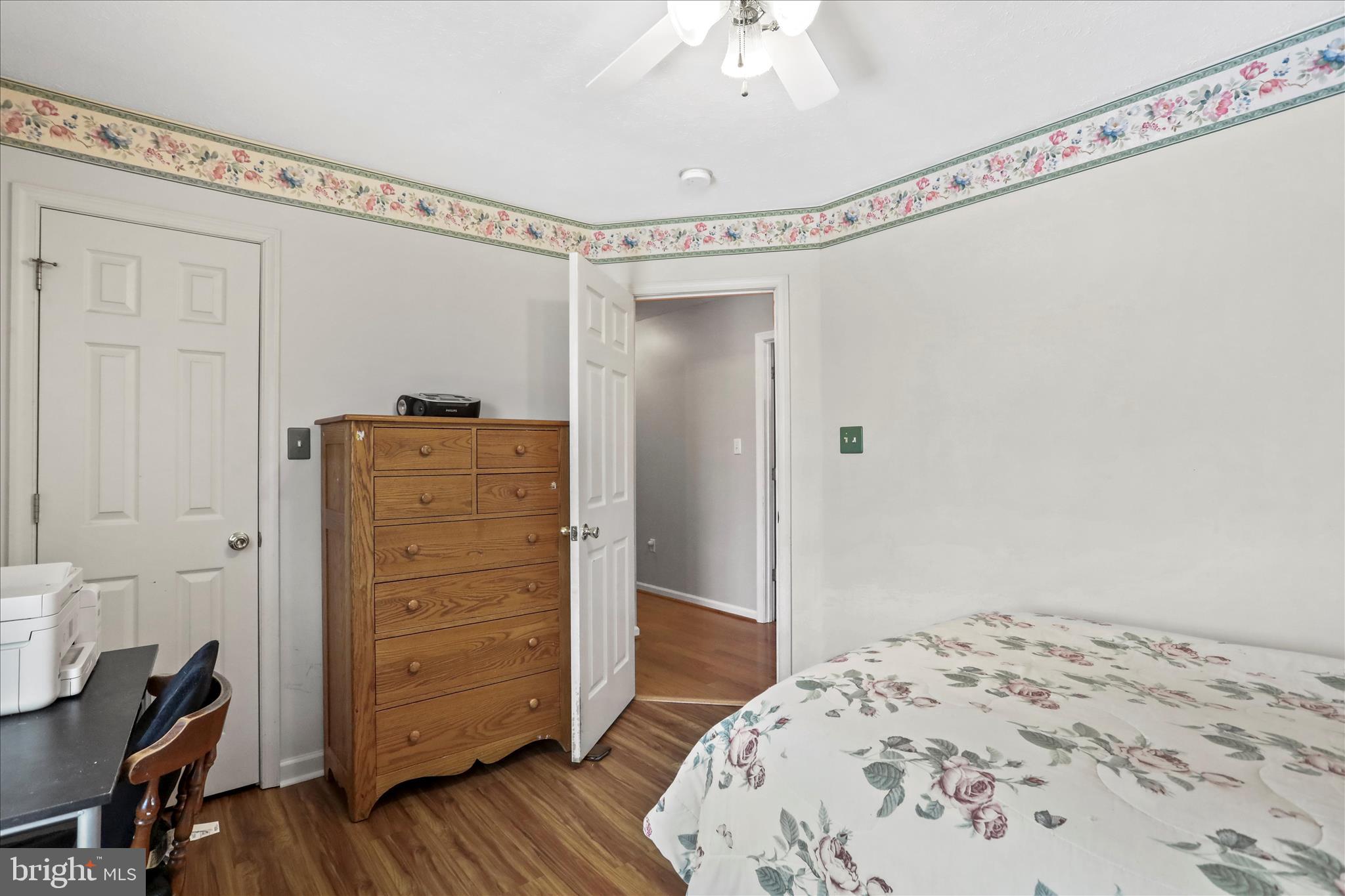 107 Briar Run Drive Ranson, WV 25438 - Photo 18 of 45 a view of a bedroom with wooden floor