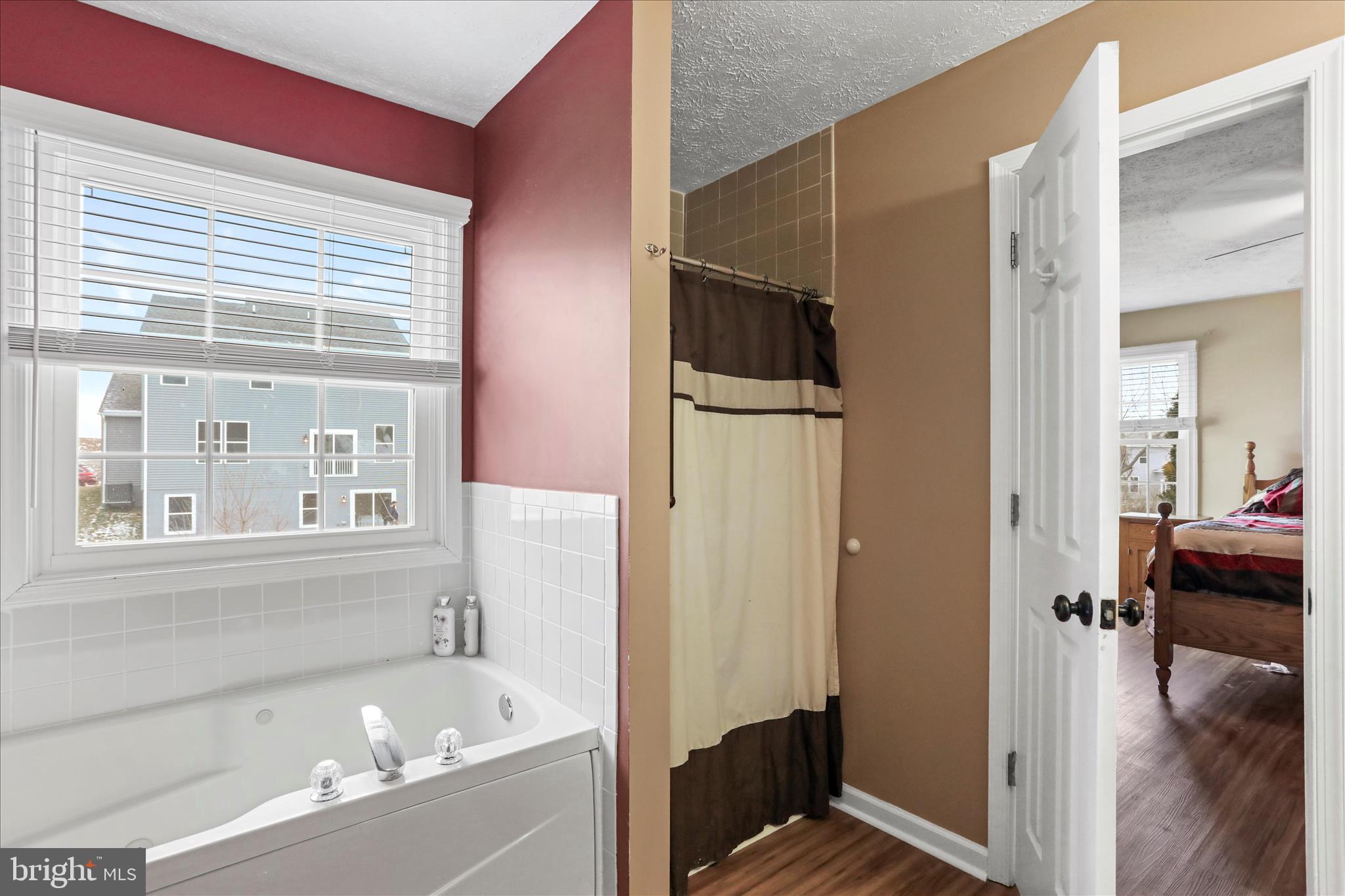 107 Briar Run Drive Ranson, WV 25438 - Photo 23 of 45 a bathroom with a bathtub and a shower