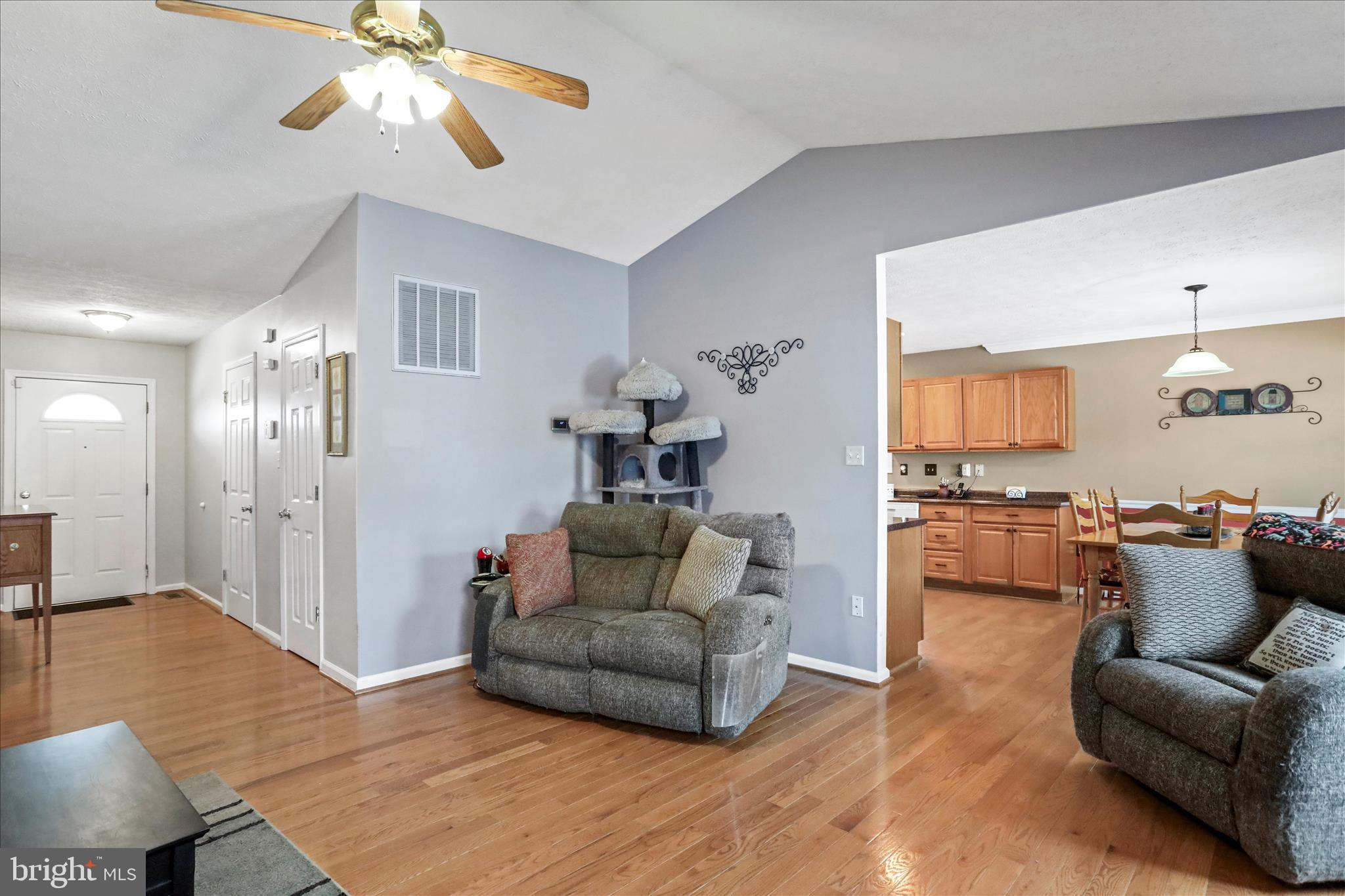 107 Briar Run Drive Ranson, WV 25438 - Photo 9 of 45 a living room with furniture and a wooden floor