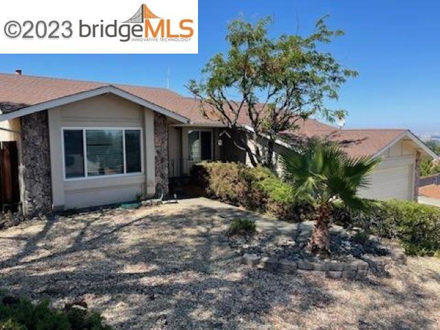 142 Encinal Place Pittsburg, CA 94565 - Photo 1 of 8 a house with trees in front of it