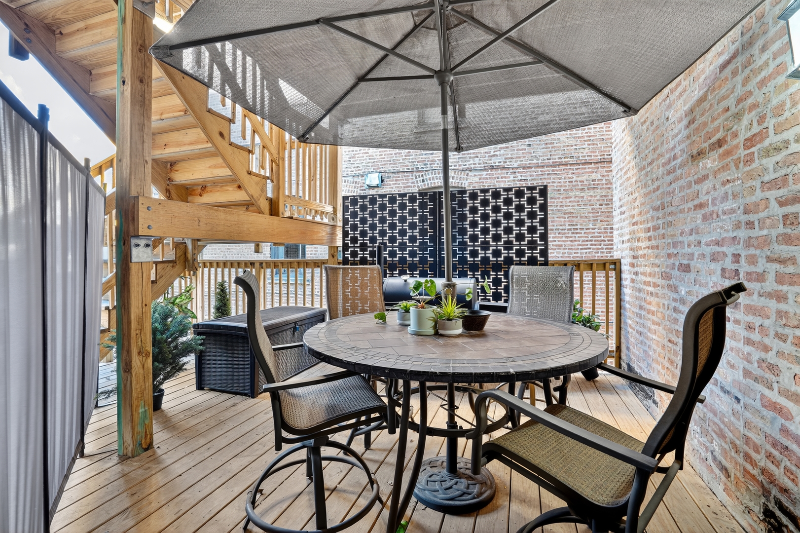 4953 South Michigan Avenue, Unit 7 Chicago, IL 60615 - Photo 13 of 13 a view of a dining room with furniture and chandelier