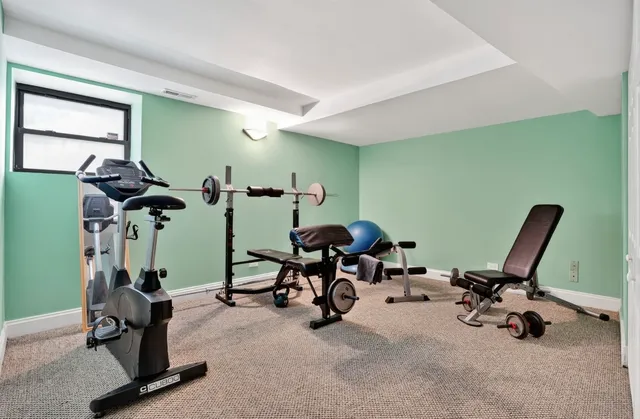 a view of a room with gym equipment