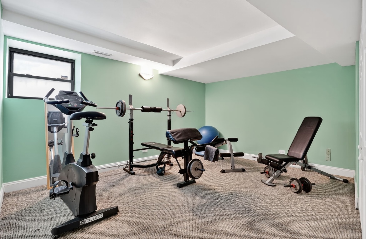 4953 South Michigan Avenue, Unit 7 Chicago, IL 60615 - Photo 9 of 13 a view of a room with gym equipment