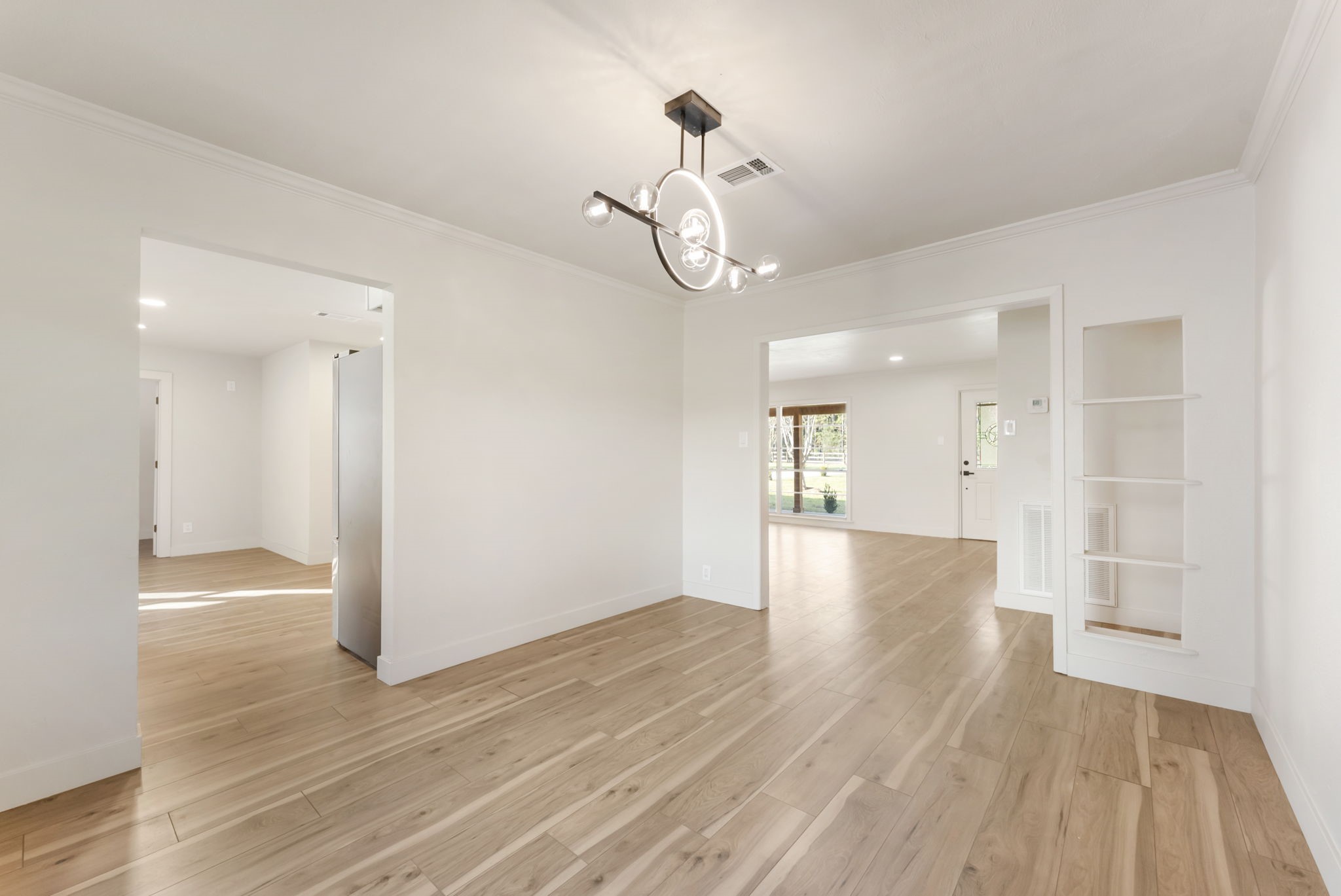 24521 Magnolia Road Hockley, TX 77447 - Photo 12 of 50 a view of a hallway with wooden floor
