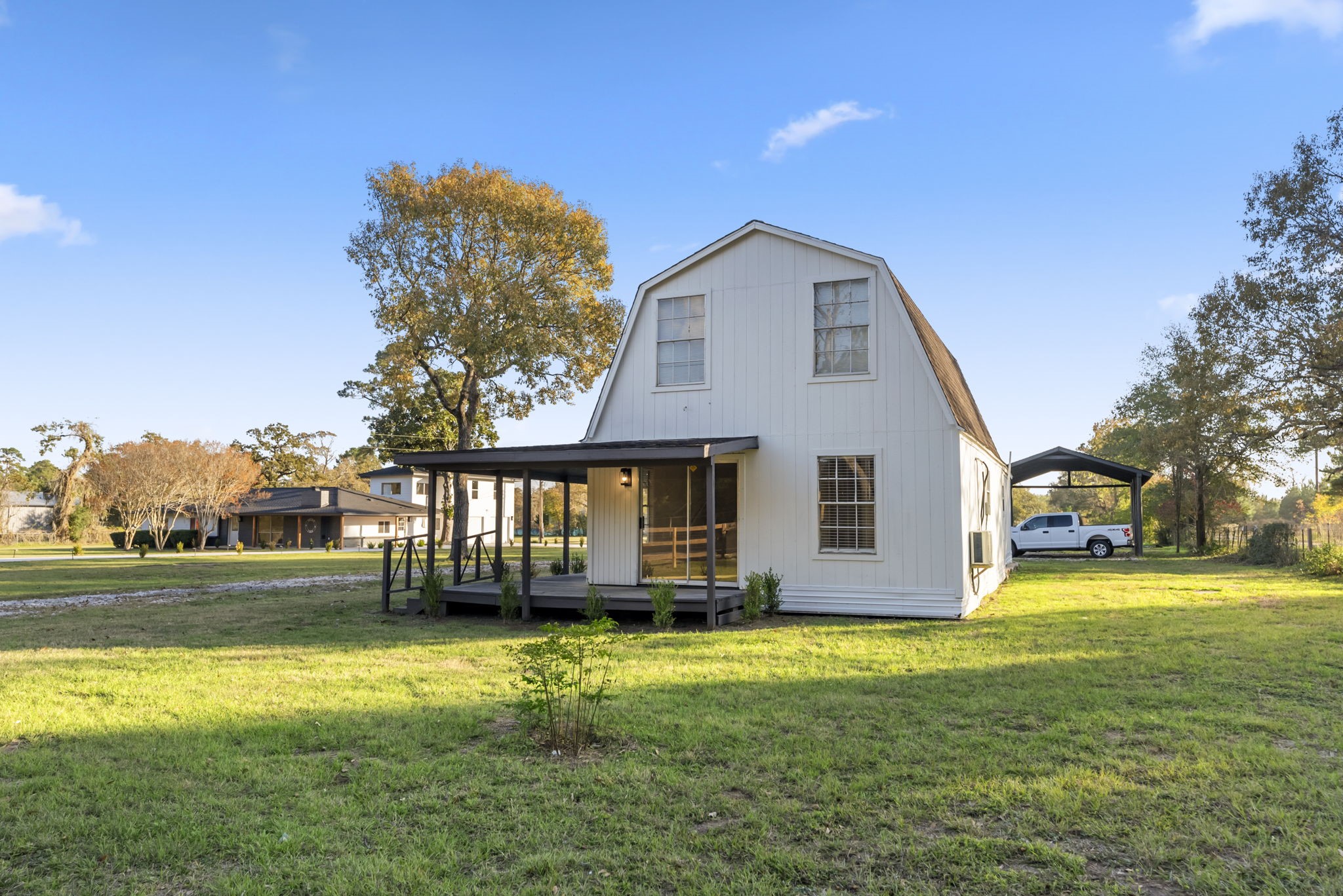 24521 Magnolia Road Hockley, TX 77447 - Photo 28 of 50 a front view of house with yard and trees in the background