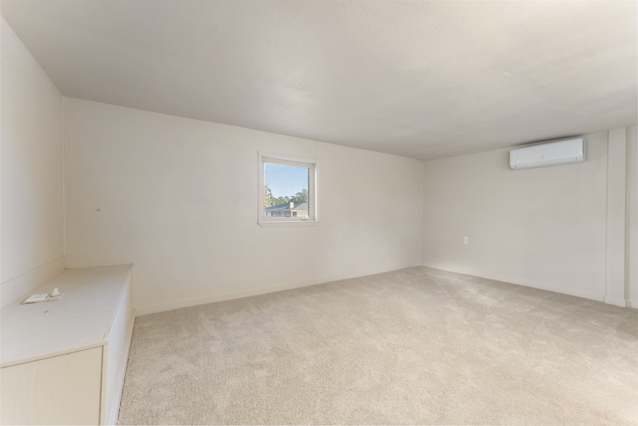 24521 Magnolia Road Hockley, TX 77447 - Photo 35 of 50 an empty room with a workbench