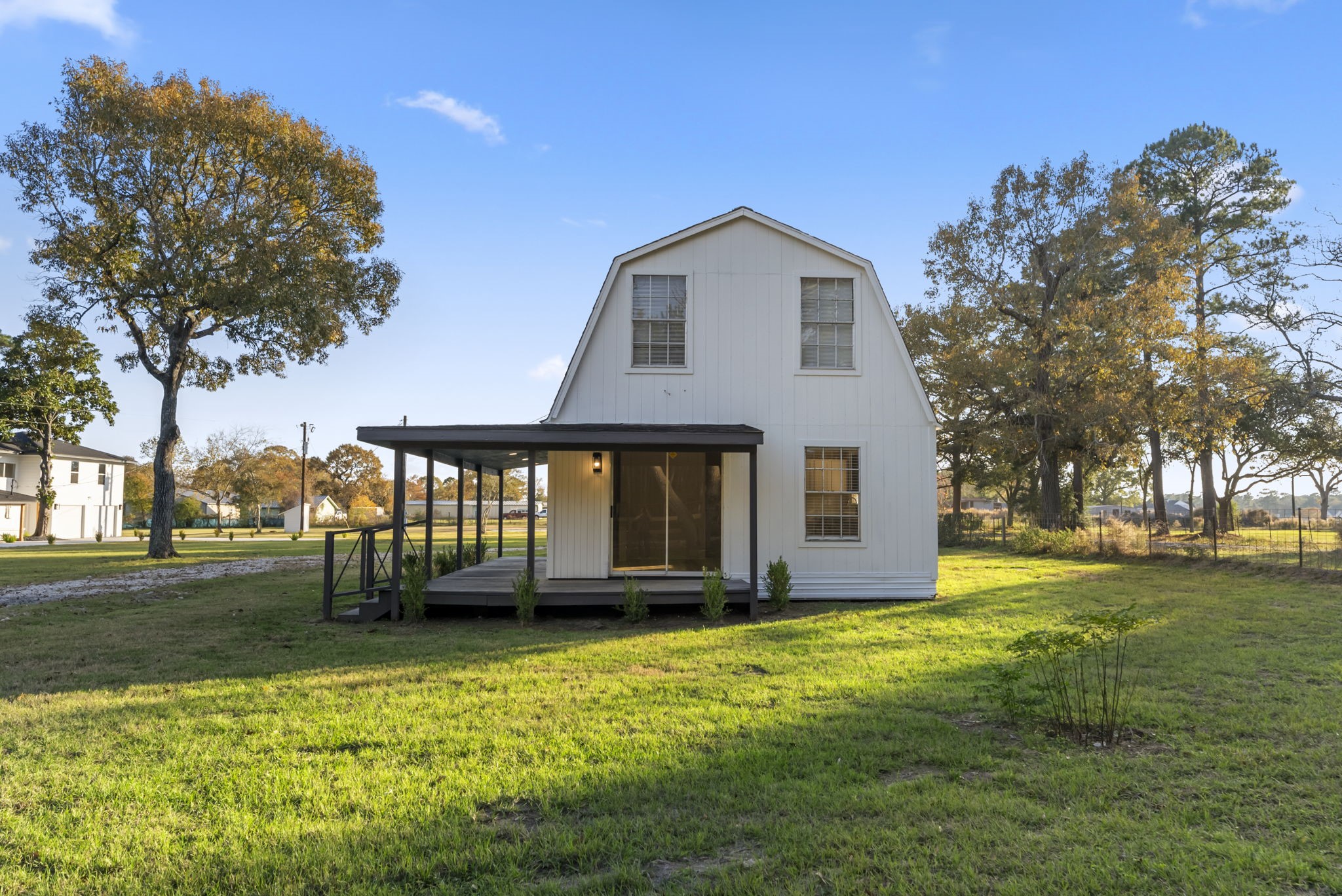 24521 Magnolia Road Hockley, TX 77447 - Photo 42 of 50 a front view of house with yard and trees
