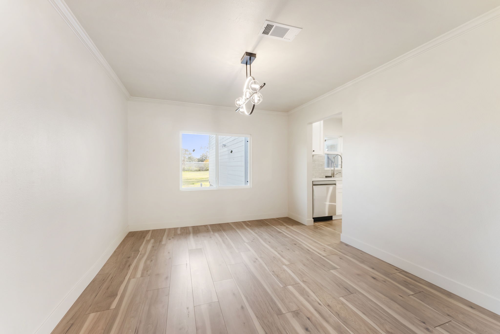 24521 Magnolia Road Hockley, TX 77447 - Photo 9 of 50 wooden floor in an empty room with a window