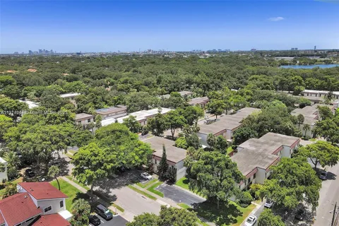 an aerial view of a city with lots of residential buildings