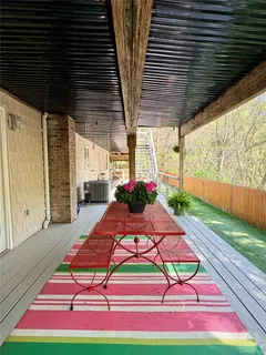 a view of backyard with a patio