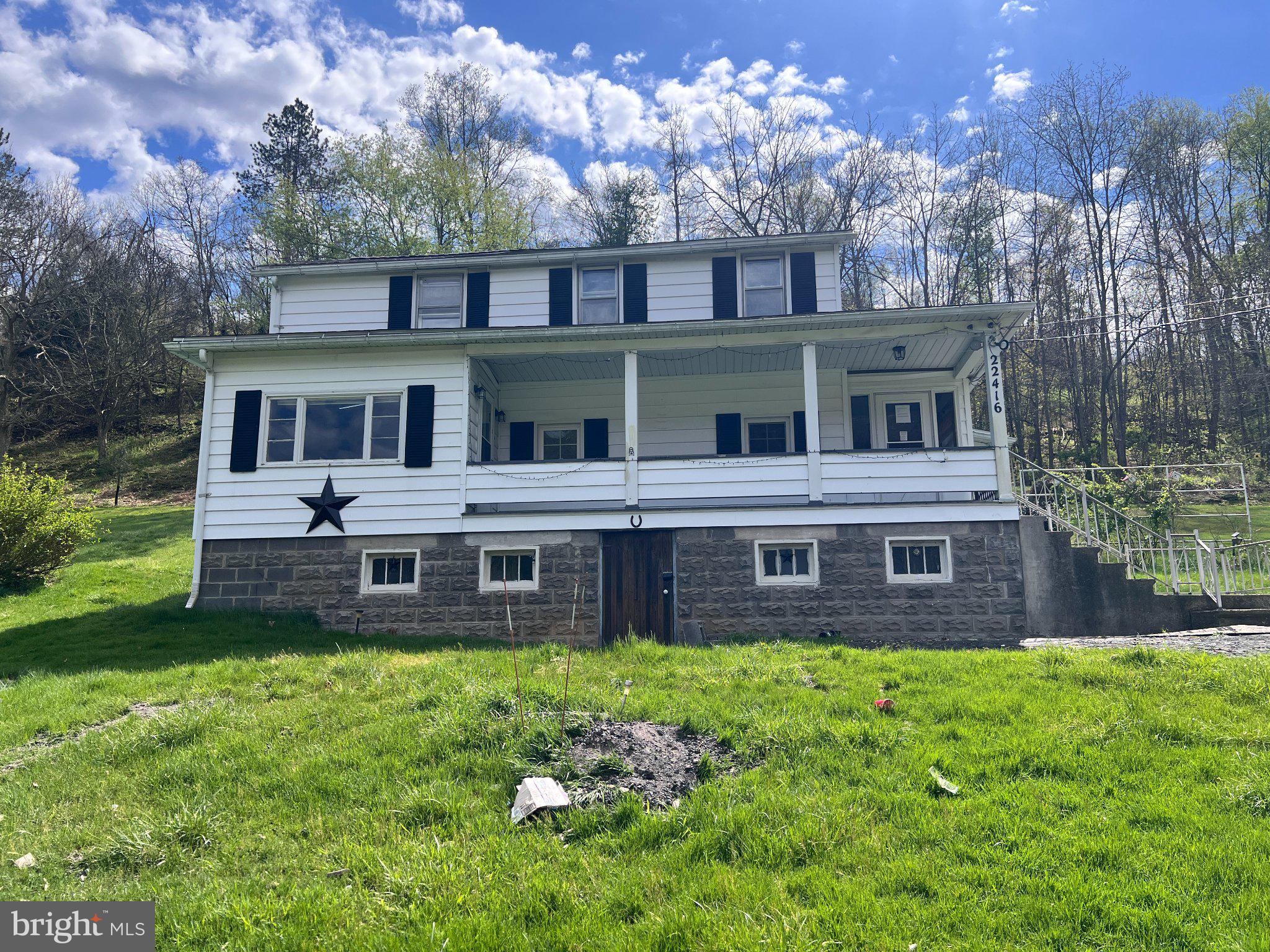 a view of a building with a yard
