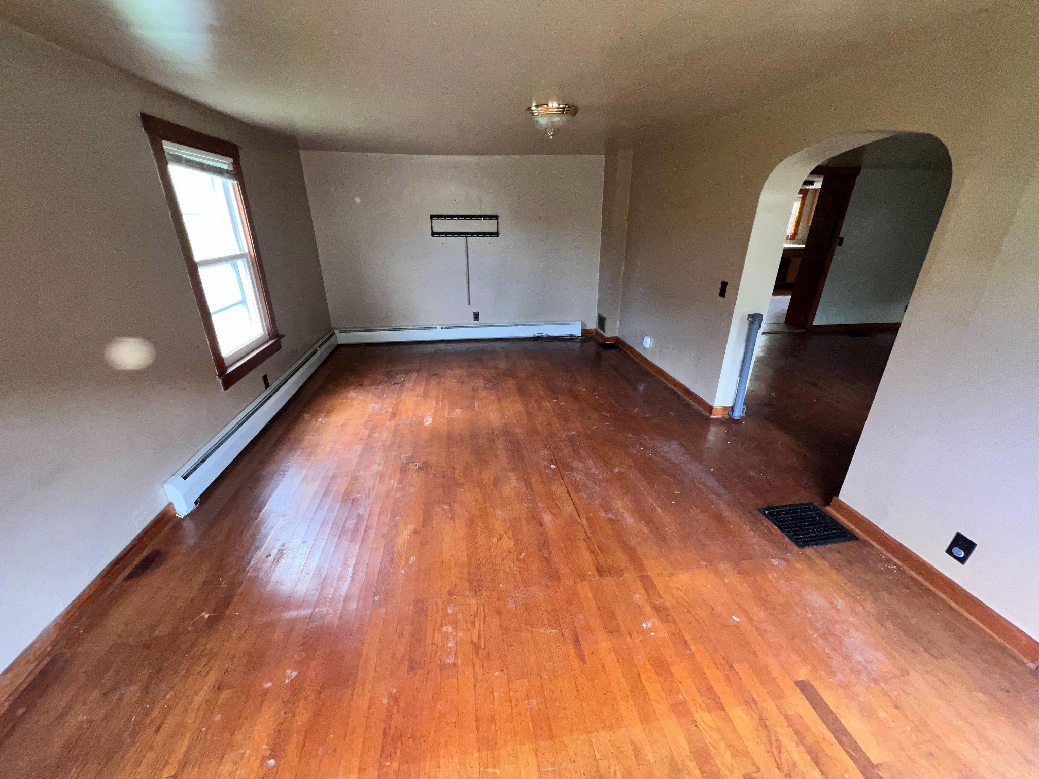 22416 Seldom Seen Road Southwest Lonaconing, MD 21539 - Photo 5 of 39 wooden floor in an empty room with a window