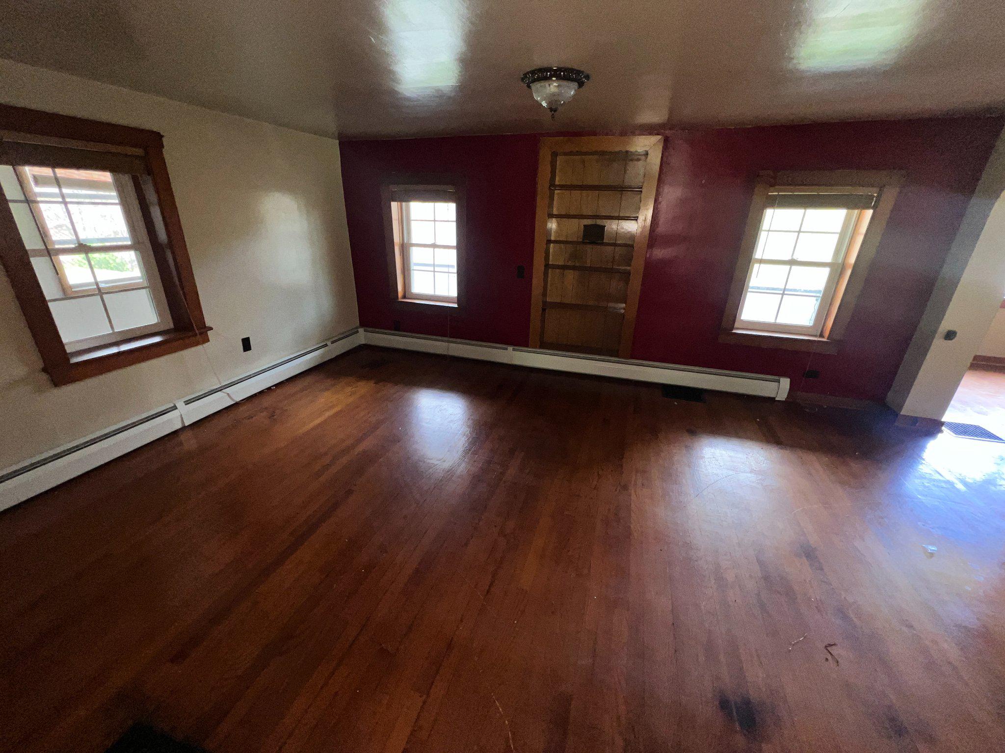 22416 Seldom Seen Road Southwest Lonaconing, MD 21539 - Photo 7 of 39 wooden floor in an empty room with a window