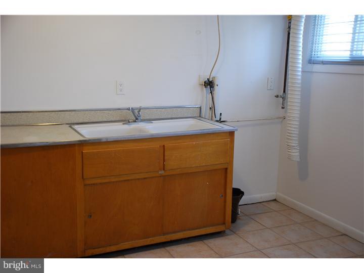 7784 Green Valley Road Wyncote, PA 19095 - Photo 18 of 19 Laundry Room