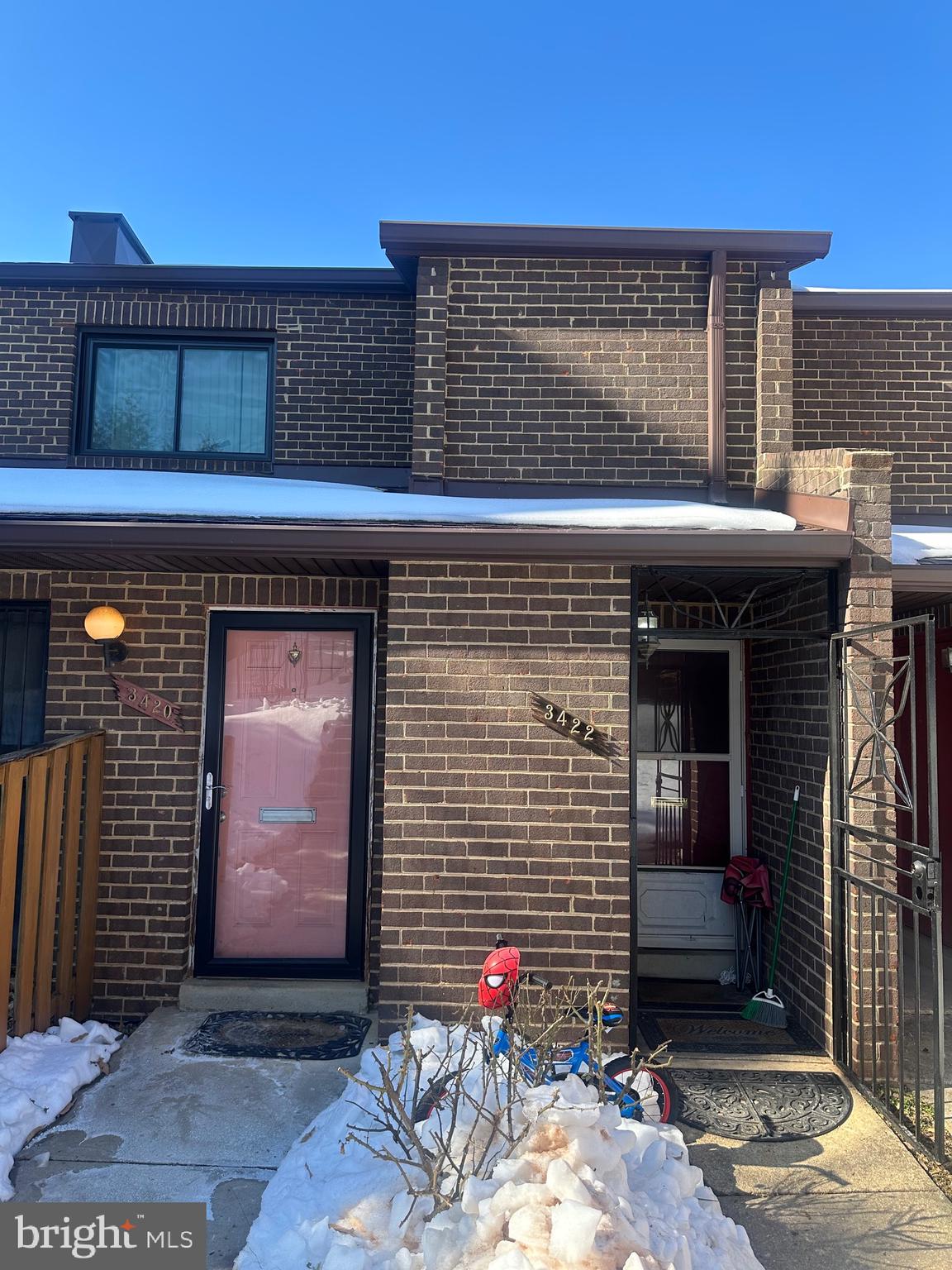 3422 Summit Court Northeast Washington, DC 20018 - Photo 4 of 6 a front view of a house with a yard