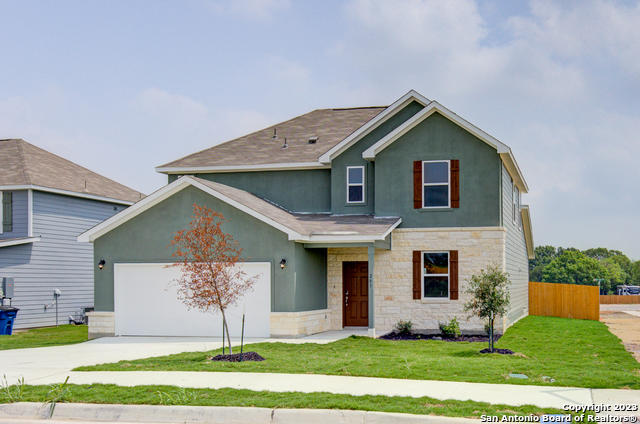 203 Brook Shadow Cibolo, TX 78108 - Photo 1 of 1 a front view of a house with a yard