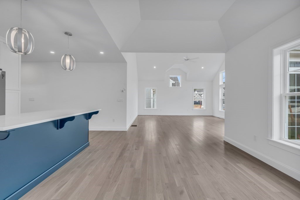 47 Cobblestone Circle Mashpee, MA 02649 - Photo 7 of 25 wooden floor in an empty room with a window