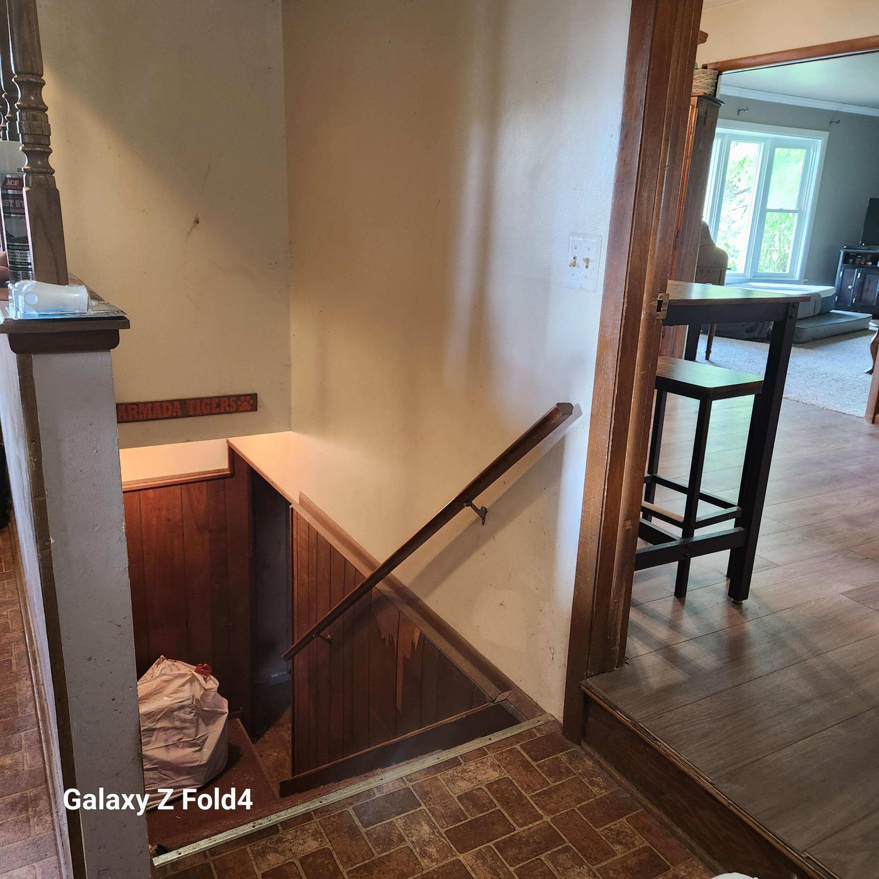 22900 Armada Center Road Armada, MI 48005 - Photo 13 of 27 basement stairs in breezeway