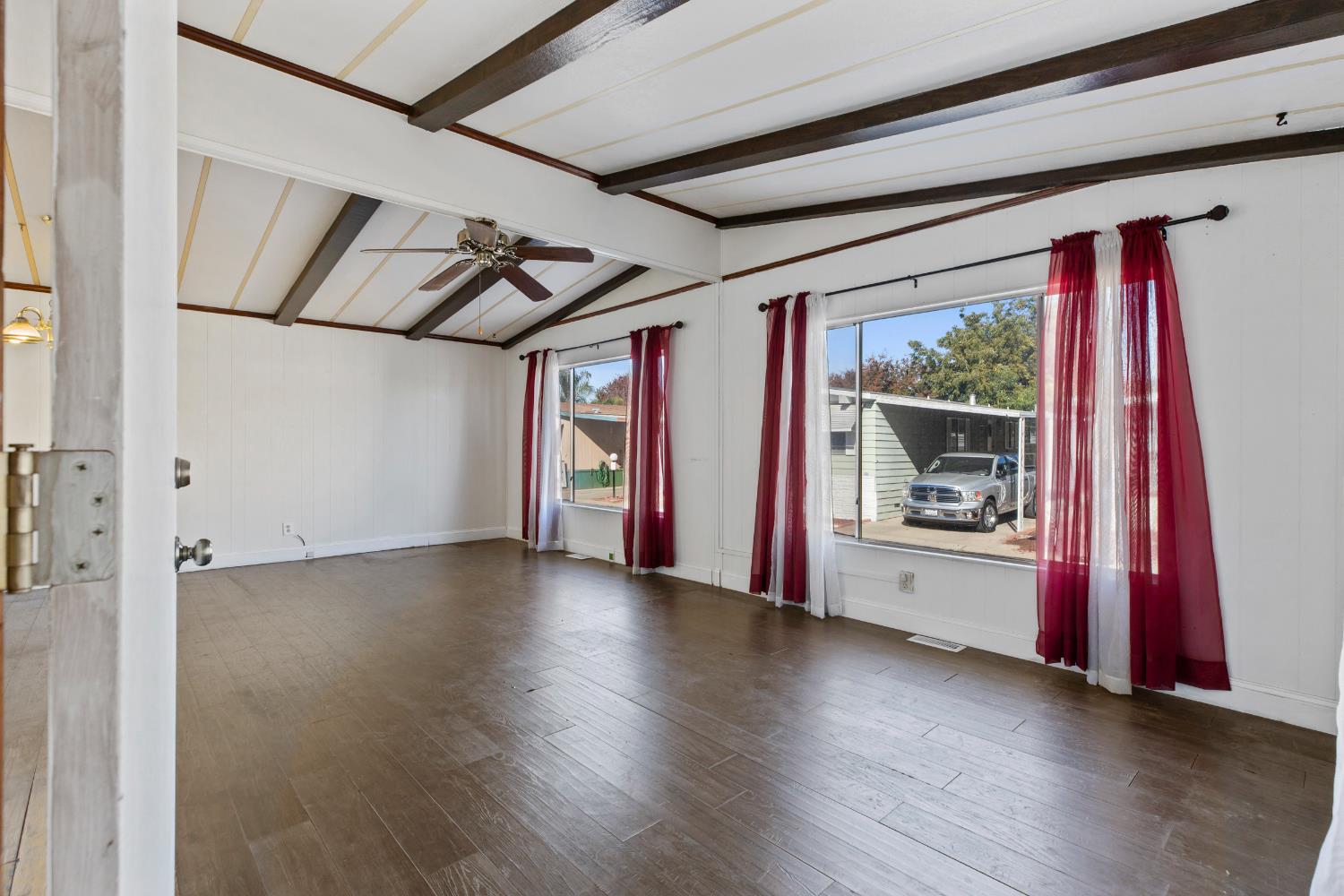 1200 South Carpenter Road, Unit 18 Modesto, CA 95351 - Photo 6 of 30 a view of a hardwood & an empty room