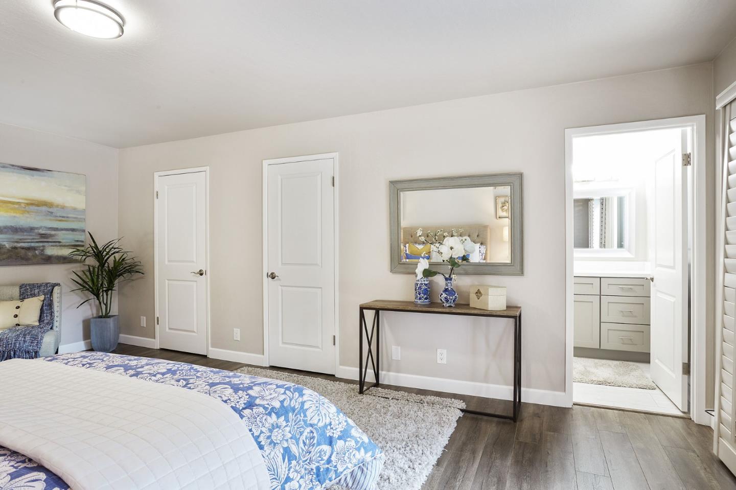 1015 Sycamore Drive Millbrae, CA 94030 - Photo 11 of 26 a bedroom with a bed and a dresser