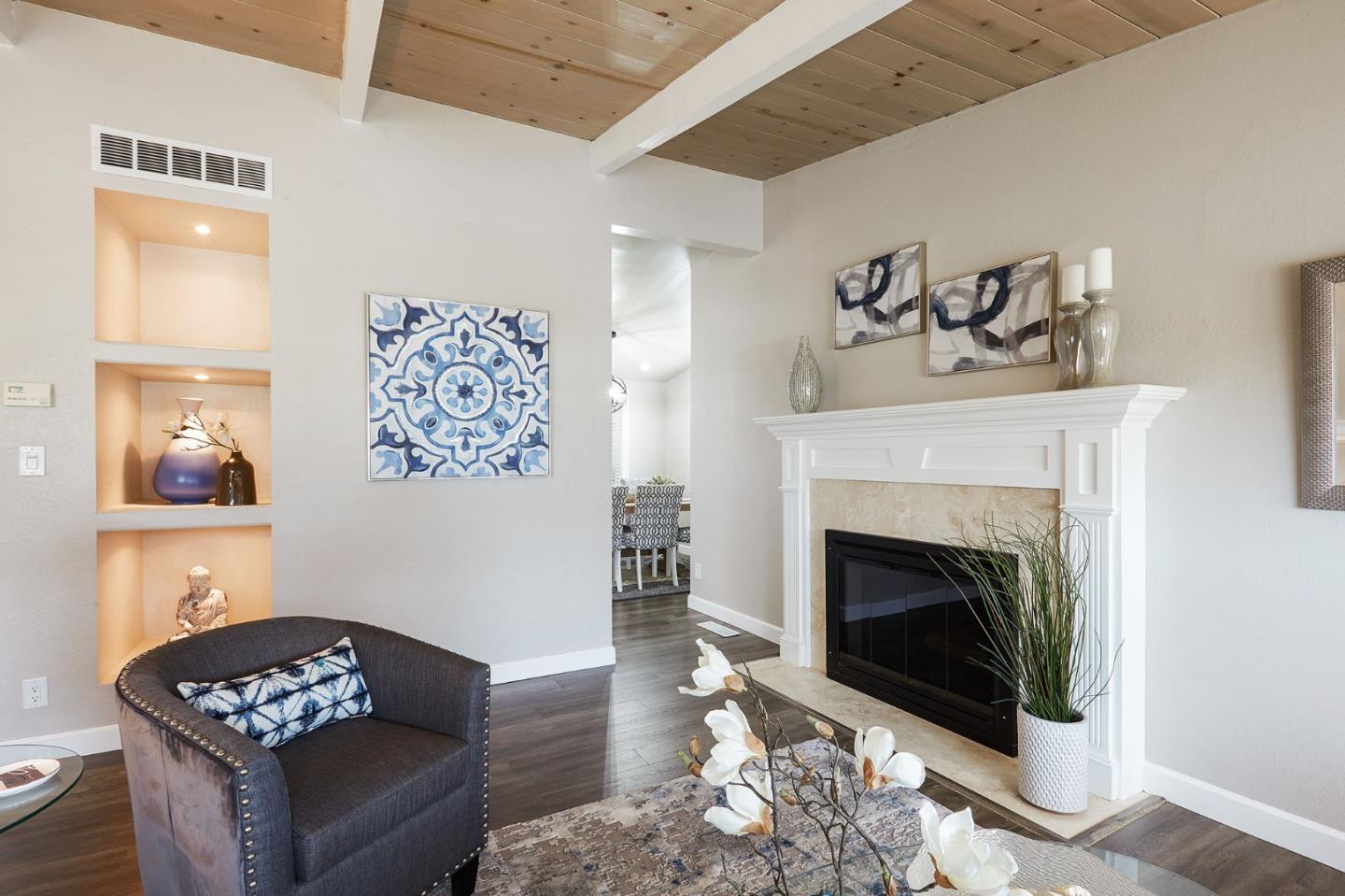 1015 Sycamore Drive Millbrae, CA 94030 - Photo 3 of 26 a living room with furniture and a fireplace